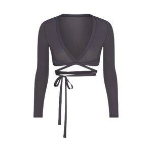 lead NikeSKIMS weightless layers wrap top